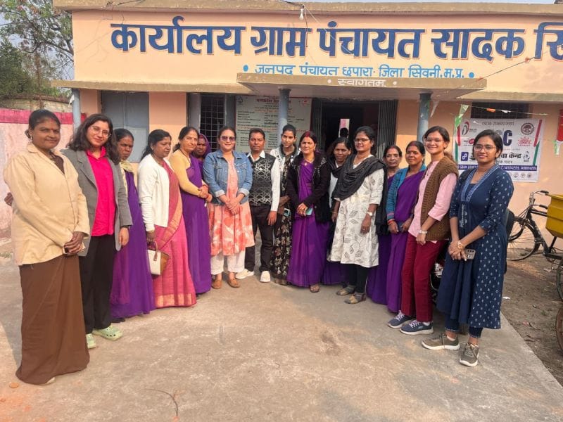 A group of health workers in front of the Gram Panchayat office
