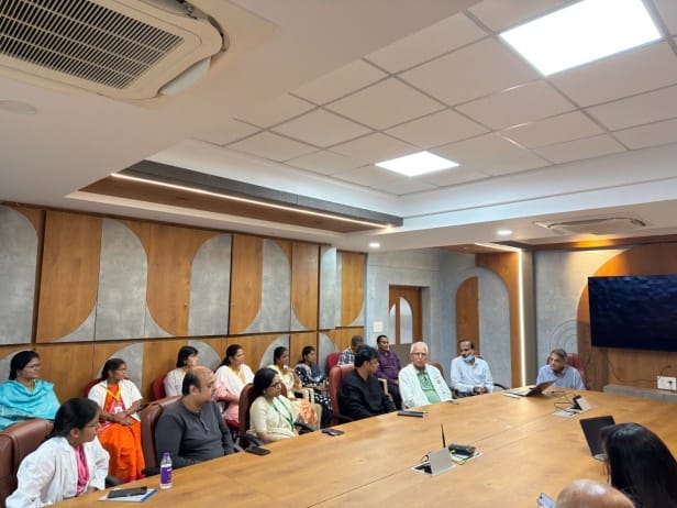 Dr. P. S. Reddy, Dr. Madhu Mohan, and Dr. Shailendra Dandge, along with other SRC members, are having a meeting