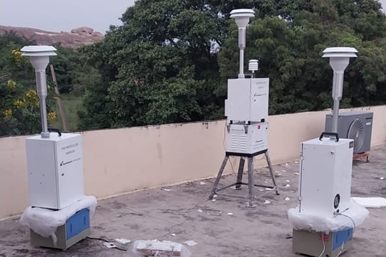 Air quality monitoring devices installed on rooftop for environmental data collection