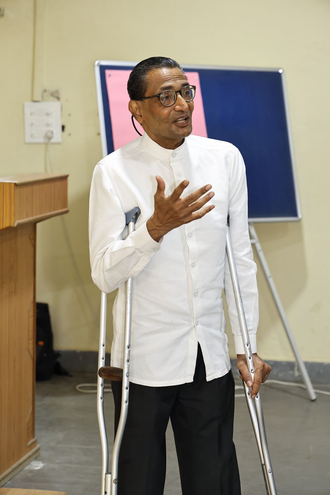 Dr. Vijay Yeldandi speaking at a conference